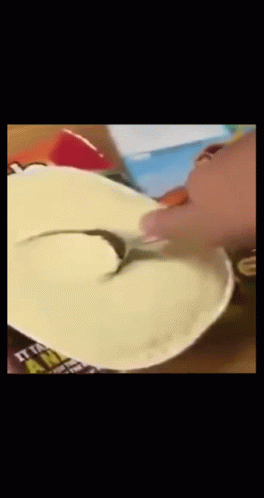 Spoon Sticking Out of Box Saying It's a Wrap