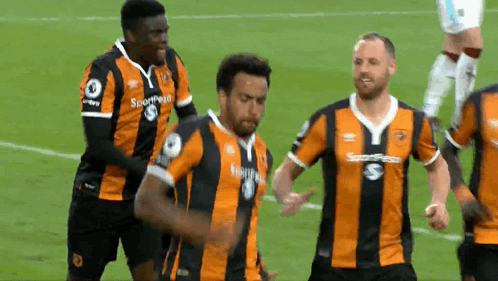 Sportpesa Soccer Players Orange and Black Striped Jerseys
