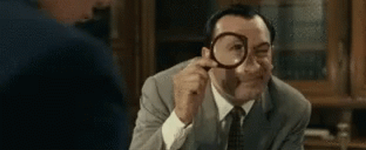 Spying Using Magnifying Glass  GIF