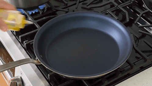 Squeeze Olive Oil In The Pan GIF