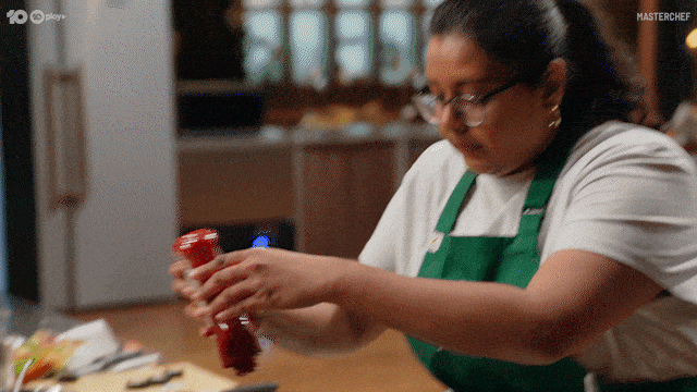Squeezing Bottle Of Tomato Sauce GIF