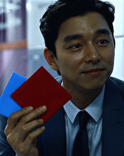 Squid Game Gong Yoo Holding Cards GIF