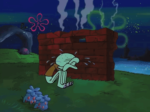 Squidward Crying In Front Of Red Brick Wall GIF