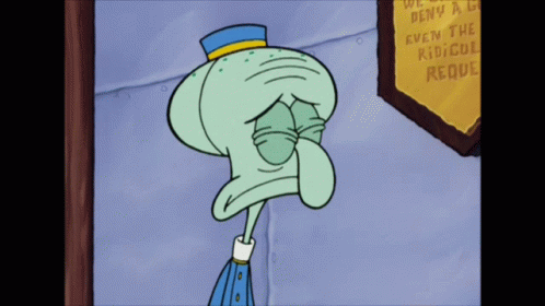 Squidward From Spongebob Squarepants Is Crying In Front Of A Sign GIF