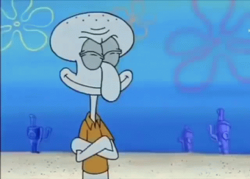 squidward from spongebob squarepants is holding a frisbee in his hands .