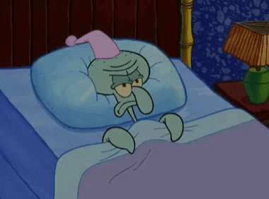Squidward From Spongebob Squarepants Is Laying In Bed Wearing A Nightcap And A Hat . GIF