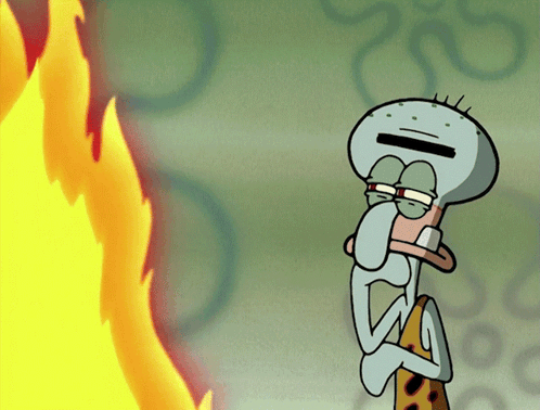 Squidward From The Cartoon Spongebob Squarepants Stands In Front Of A Fire GIF