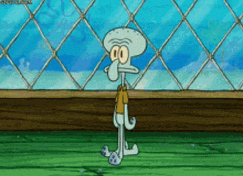 Squidward Standing In Front Of Fence GIF