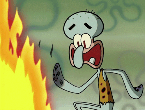 Squidward Standing in Front of Fire