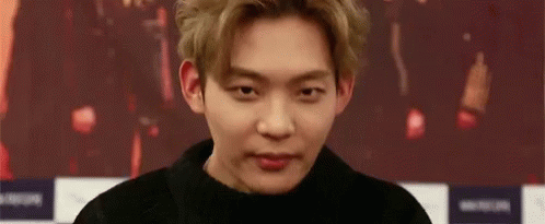Squinting Korean Popstar Xeno T GIF