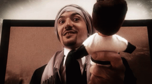 Stabbing Voodoo Doll Attempt GIF