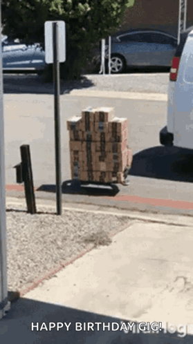 Stack Of Boxes On Cart Saying Happy Birthday Gig GIF