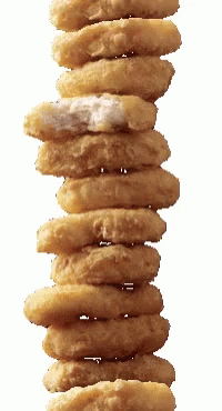 Stack Of Chicken Nuggets With One Missing GIF