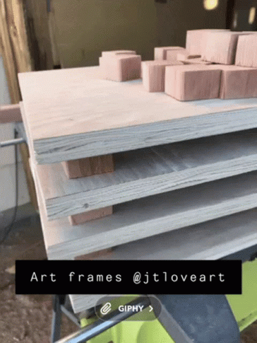 Stack of Wooden Boards Saying Art Frames