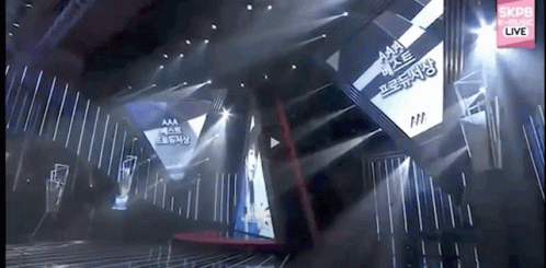 Stage With Large Screen Saying aaa