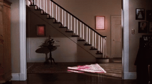 Staircase With Picture Saying A GIF