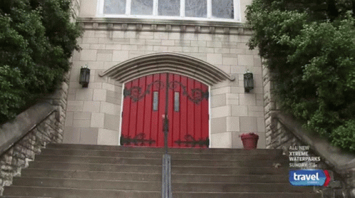 Stairs Leading Up To A Red Door That Says Travel GIF