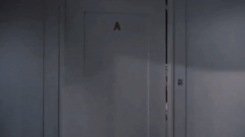 Stalking Behind Door Vintage Movie Clip GIF