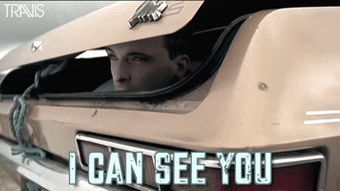 Stalking Piercing Eyes Under Car Hood GIF