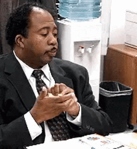 Stanley Hudson Throws The Paper GIF