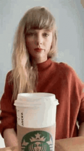 Taylor Swift Indulging In Starbucks GIF