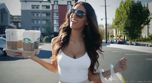 Classy Lady Carrying Tray Of Starbucks GIF