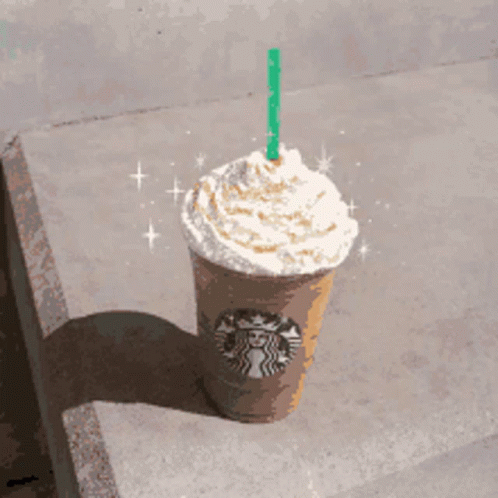 Starbucks Drink With Whipped Cream and Straw