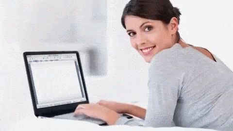 Staring Woman Random Typing Pretending To Work GIF