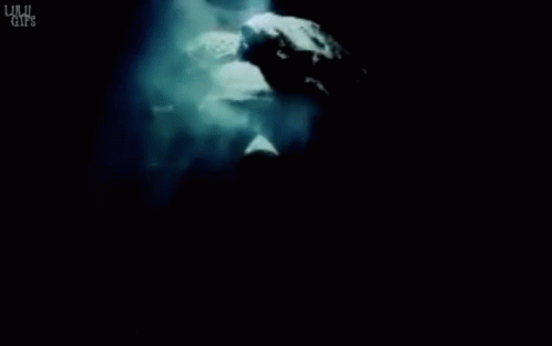 Statue of a Man Surrounded by Smoke Saying Lulu Girls