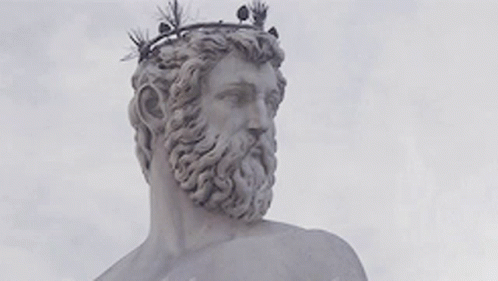 Statue Of Bearded Man With Crown GIF