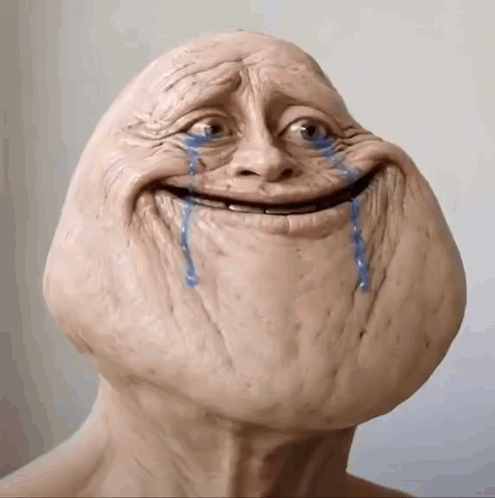 Statue Of Crying Face With Tears GIF