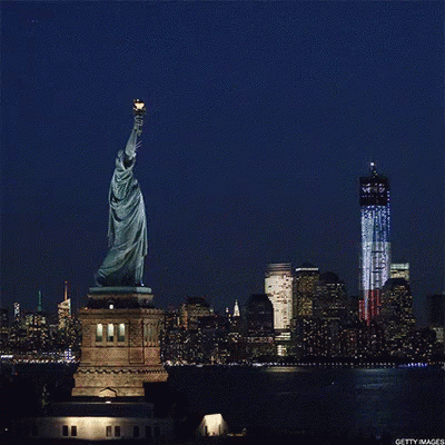 Statue of Liberty in Front of Twin Towers
