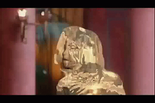 Statue of Man With Beard Covered in Ice