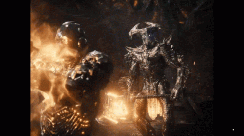 Statue Of Man With Horns Next To Another Statue GIF
