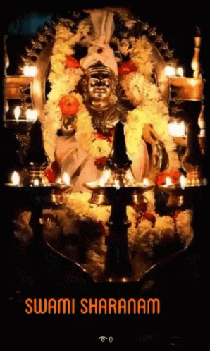 Statue of Swami Sharanam With Candles