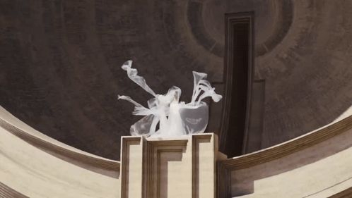 Statue With Smoke Coming Out on Pedestal