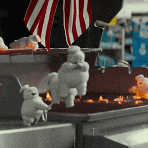 Stay Puft Marshmallow Man Playing On Fire GIF