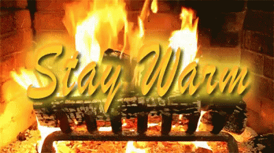 Stay Warm In This Fireplace GIF