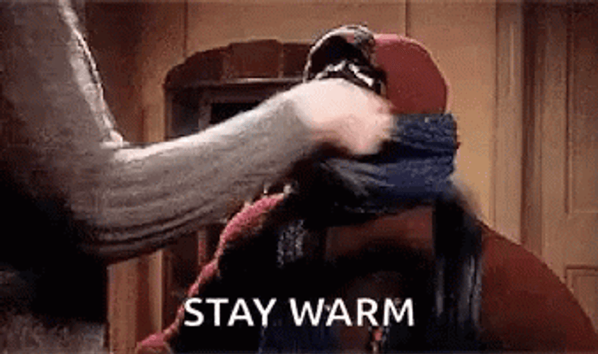 Stay Warm With Layered Scarf GIF
