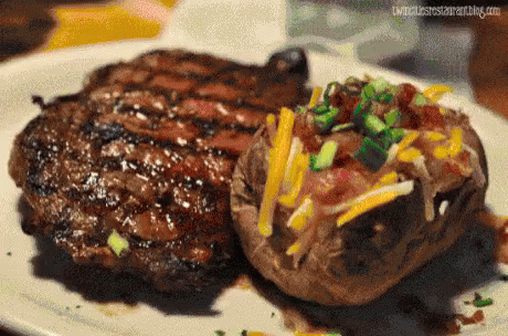 Steak And Baked Potato On Plate GIF