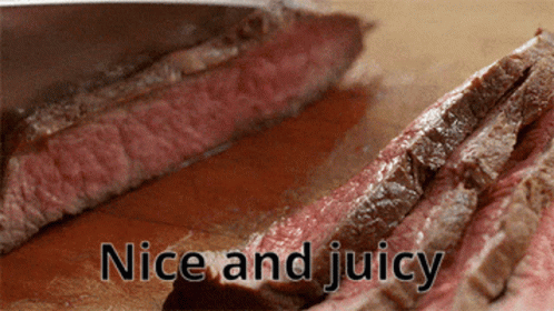 Steak Sliced On Wooden Board Saying Nice And Juicy GIF