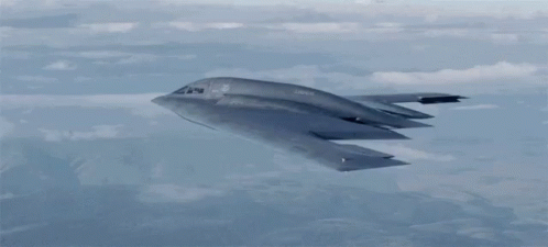 Stealth Bomber Flying Through Sky GIF