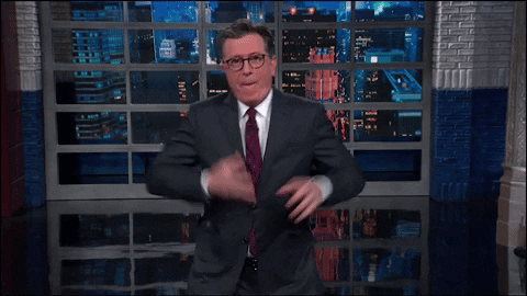 Stephen Colbert Doing Heisman Pose GIF