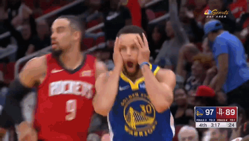 Stephen Curry Holding Head During Game GIF