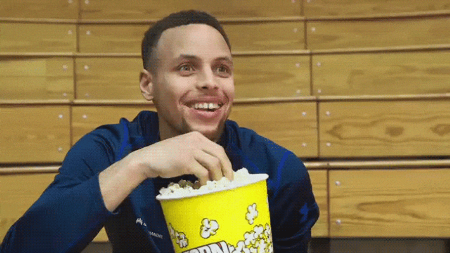 Stephen Curry Shoving Popcorn In Mouth Meme GIF
