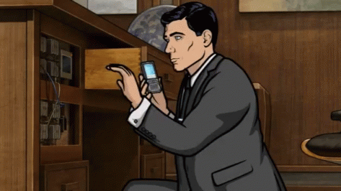 Sterling Archer Searching For Liquor GIF