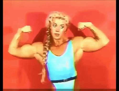 Steroids Female Body Builder Flexing Muscle GIF