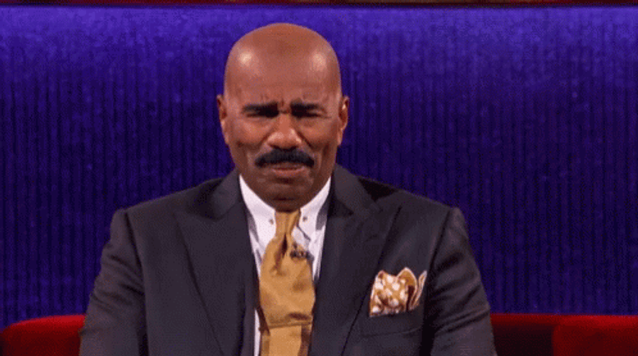 Steve Harvey Trying Not To Laugh GIF