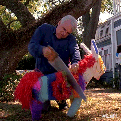 Steve Martin Saw Cutting Piñata GIF