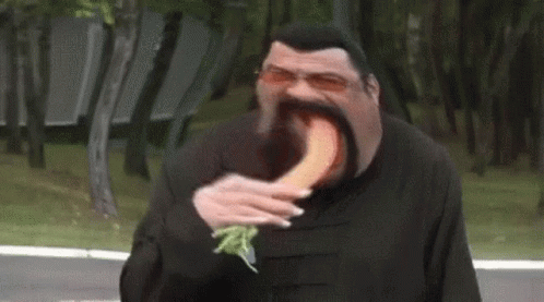 Funny Face Steven Seagal Eating Carrot GIF